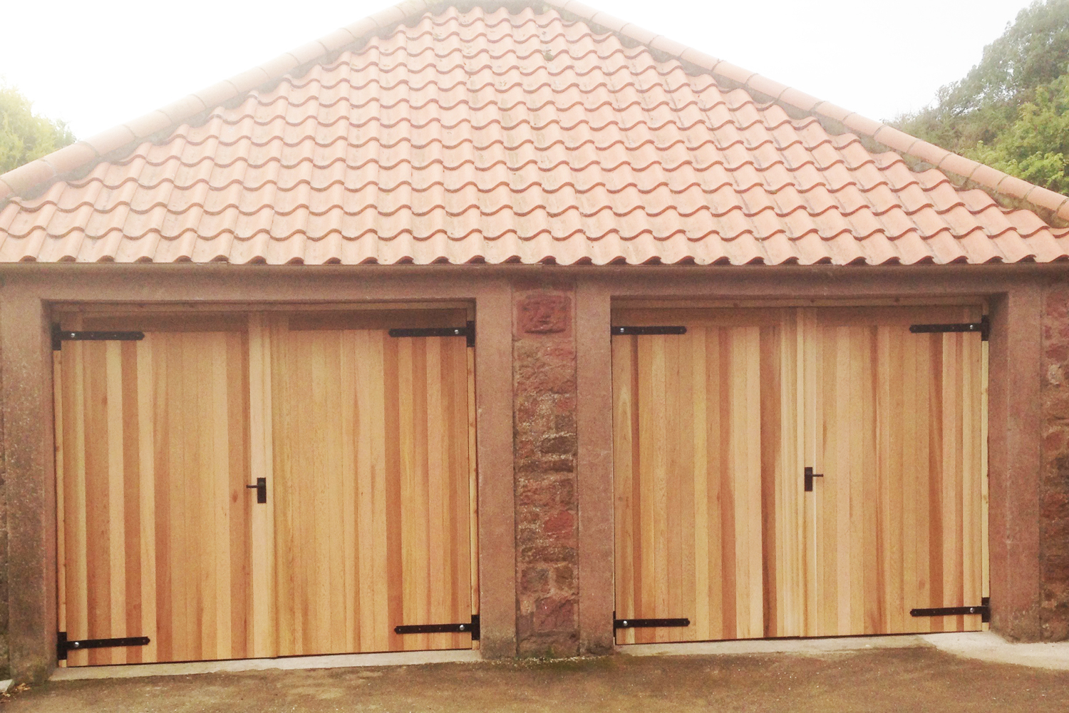 Double wooden garage doors Bryan Wilkie Joinery